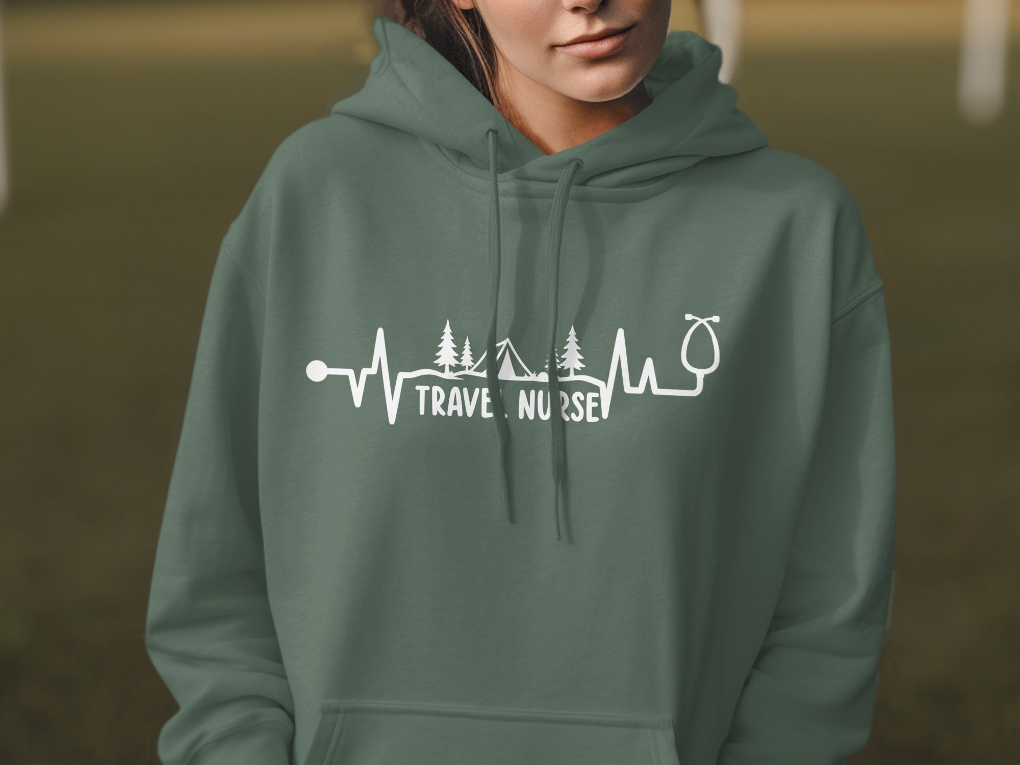 Green hoodie with "Travel Nurse" text and a heartbeat graphic.