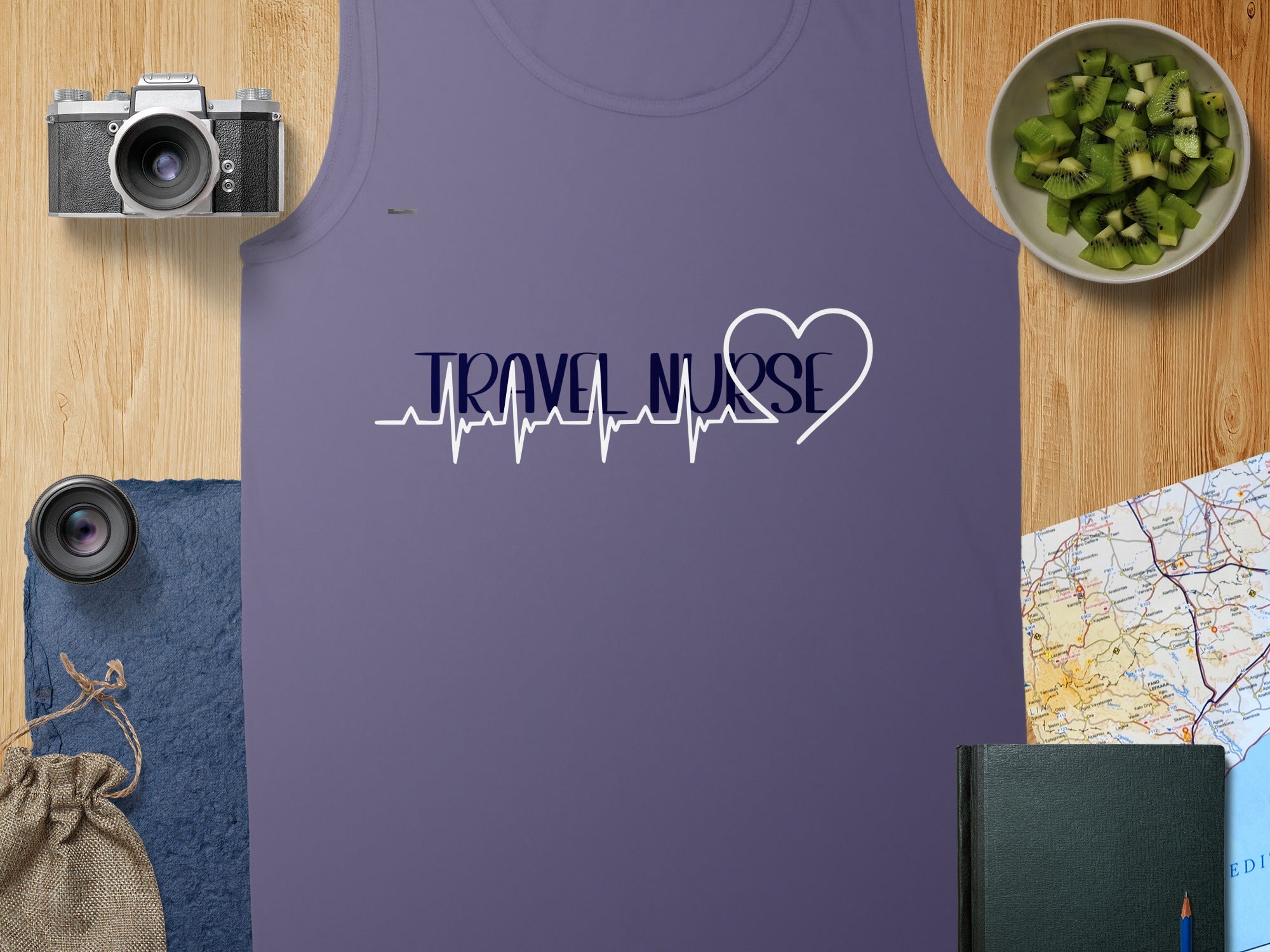Purple tank top with "TRAVEL NURSE" heartbeat graphic.