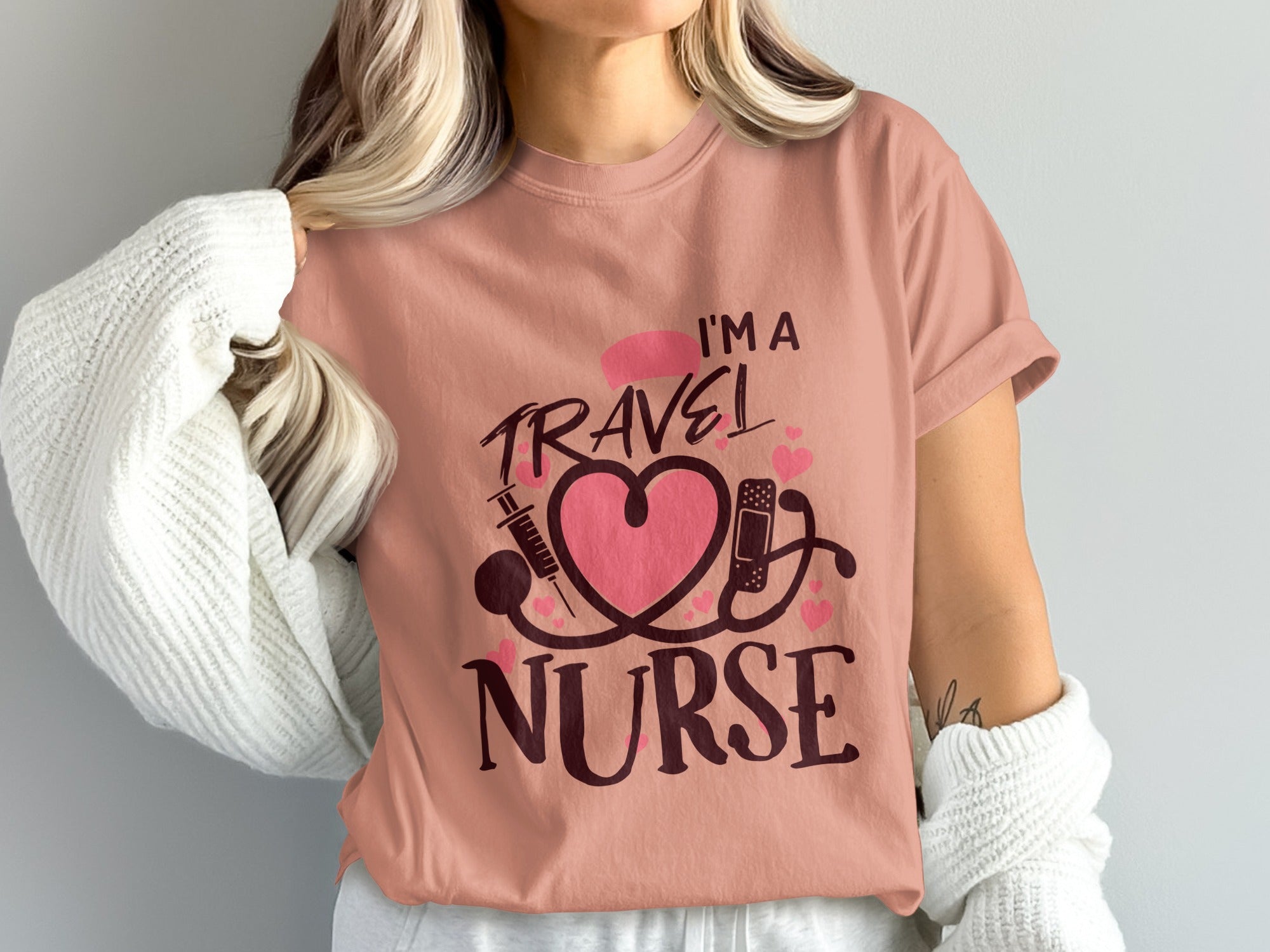 I'm a travel nurse text with stethoscope, syringe, and heart graphic.