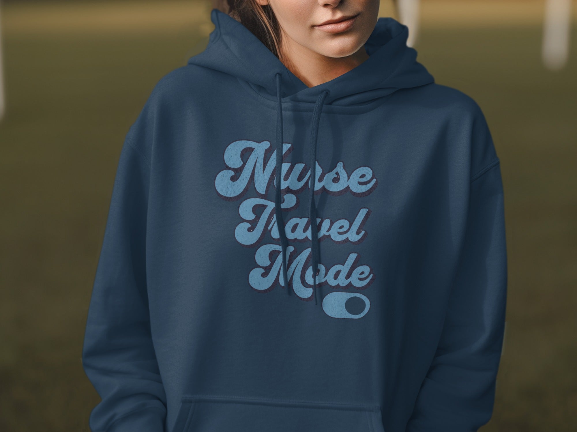 Navy hoodie with "Nurse Travel Mode" text in a retro font.