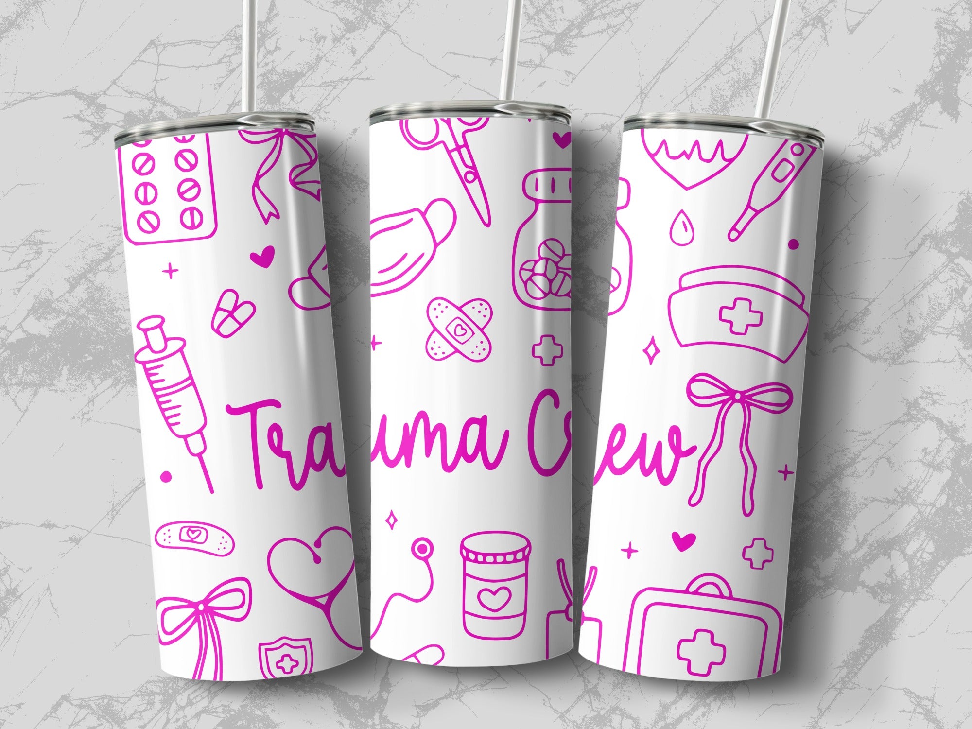 White tumbler with pink medical icons and "Trauma Crew" text.