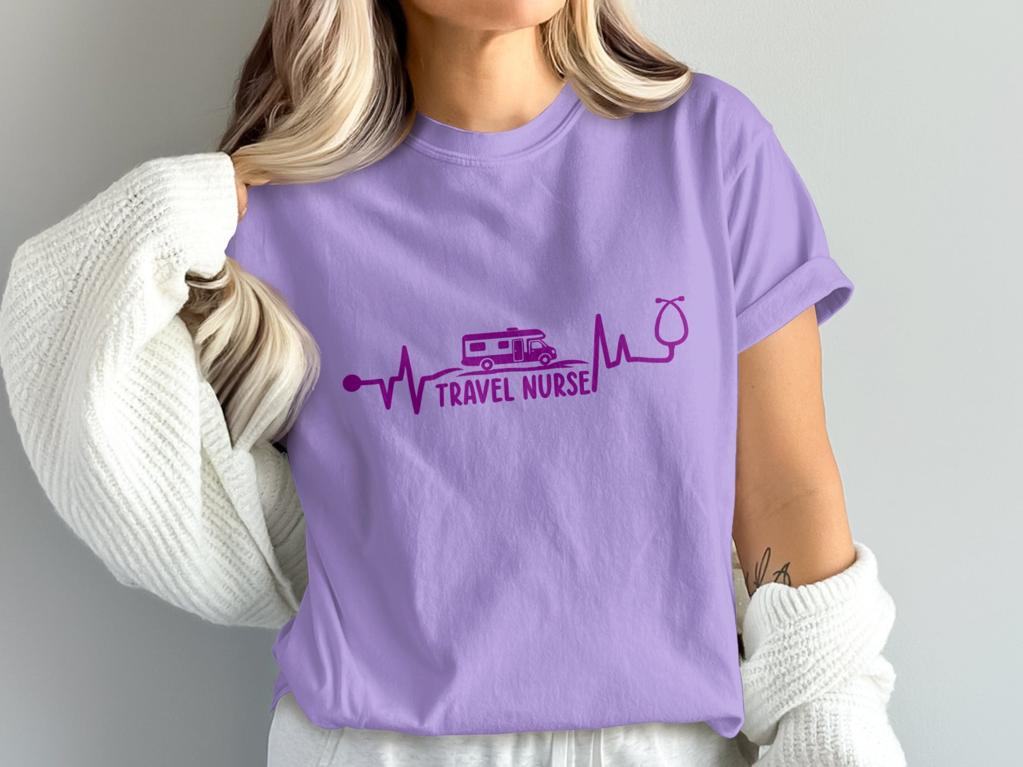 Purple t-shirt with RV, stethoscope, and "TRAVEL NURSE" text.