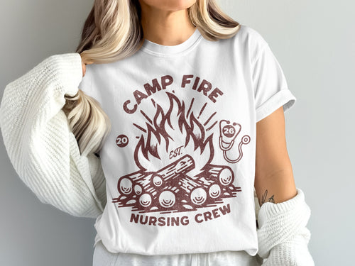 White t-shirt with "Camp Fire Nursing Crew" and campfire graphic.