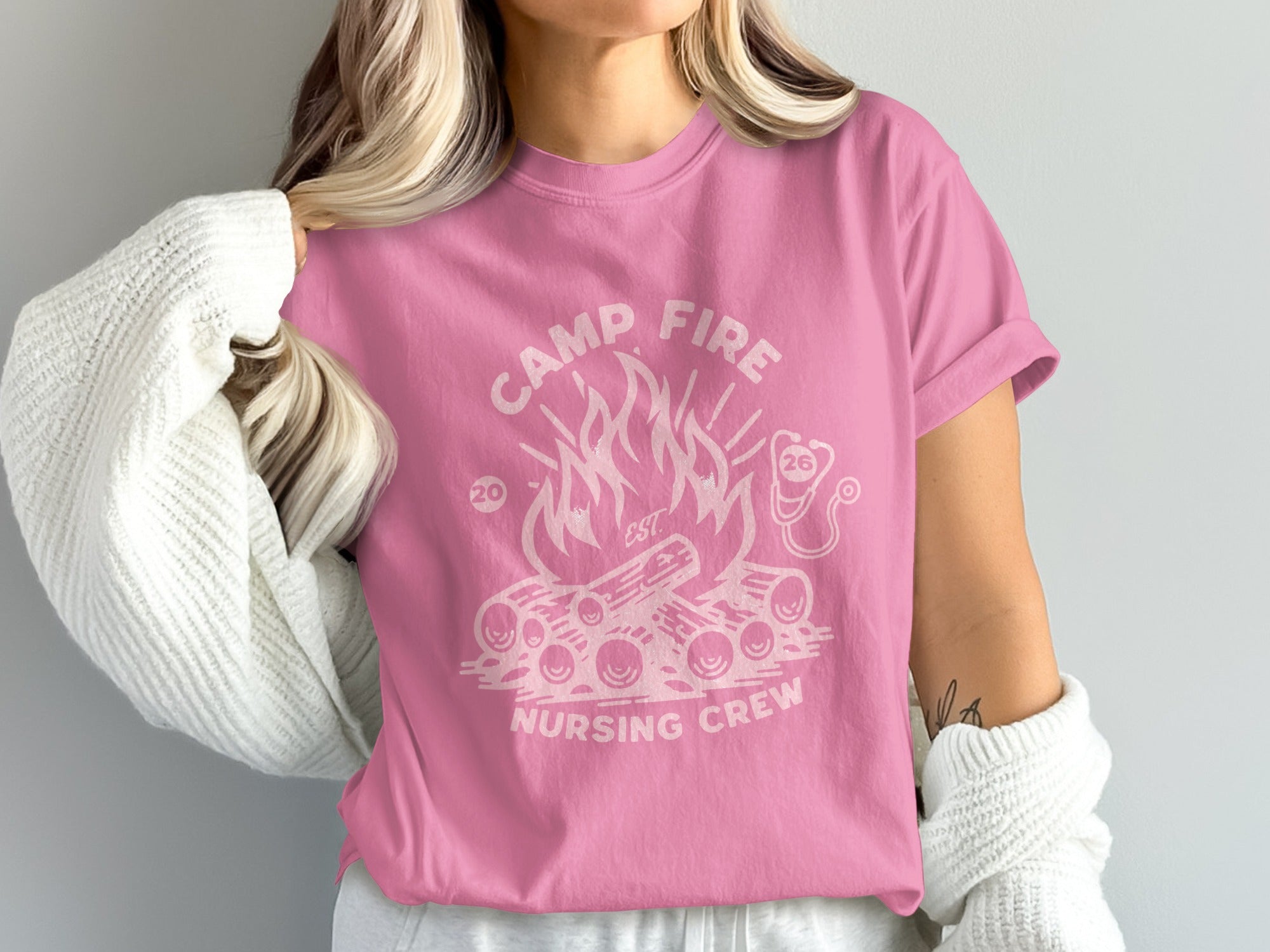 Pink t-shirt with "Camp Fire Nursing Crew" and campfire graphic.