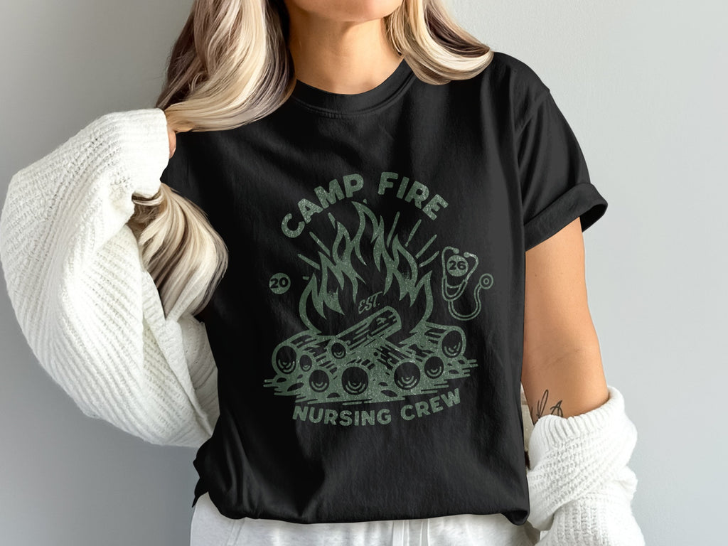 Black t-shirt with "Camp Fire Nursing Crew" and campfire graphic.