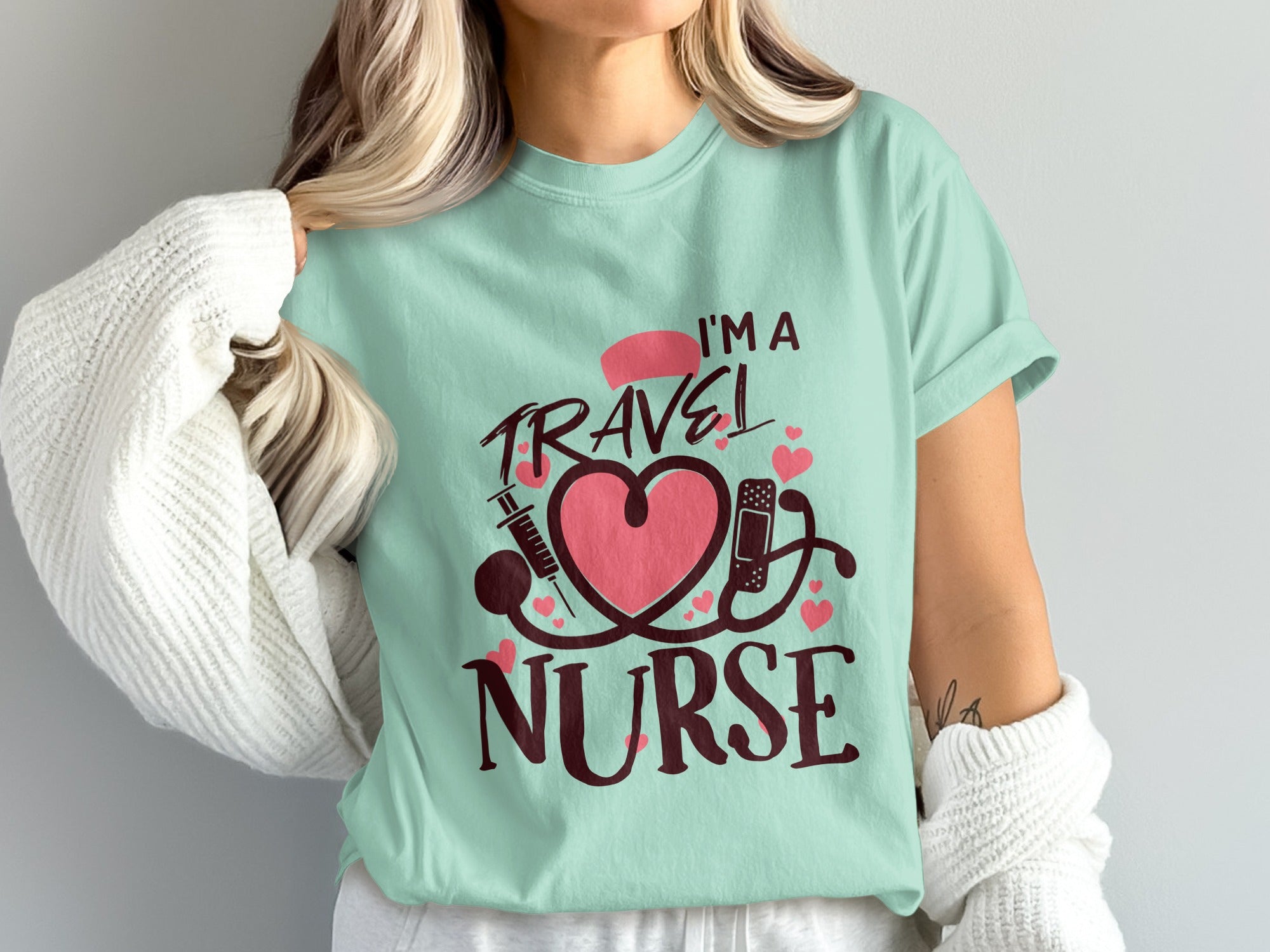 I'm a travel nurse graphic with heart, stethoscope, and syringe.