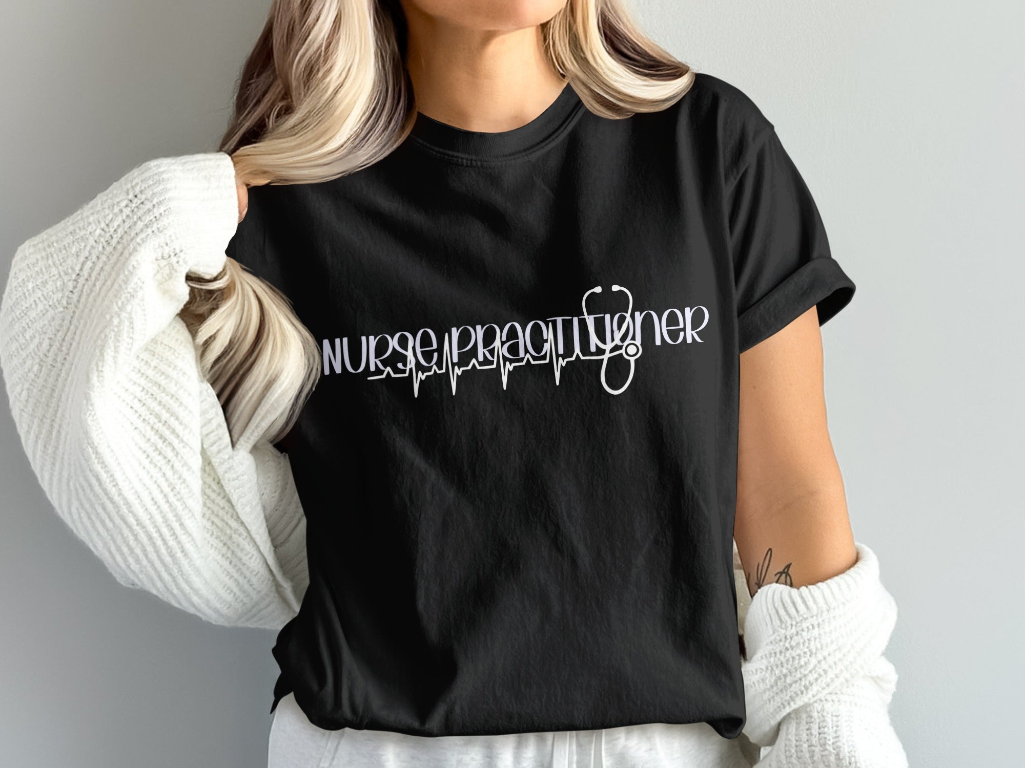 Black t-shirt with "Nurse Practitioner" text and stethoscope design.