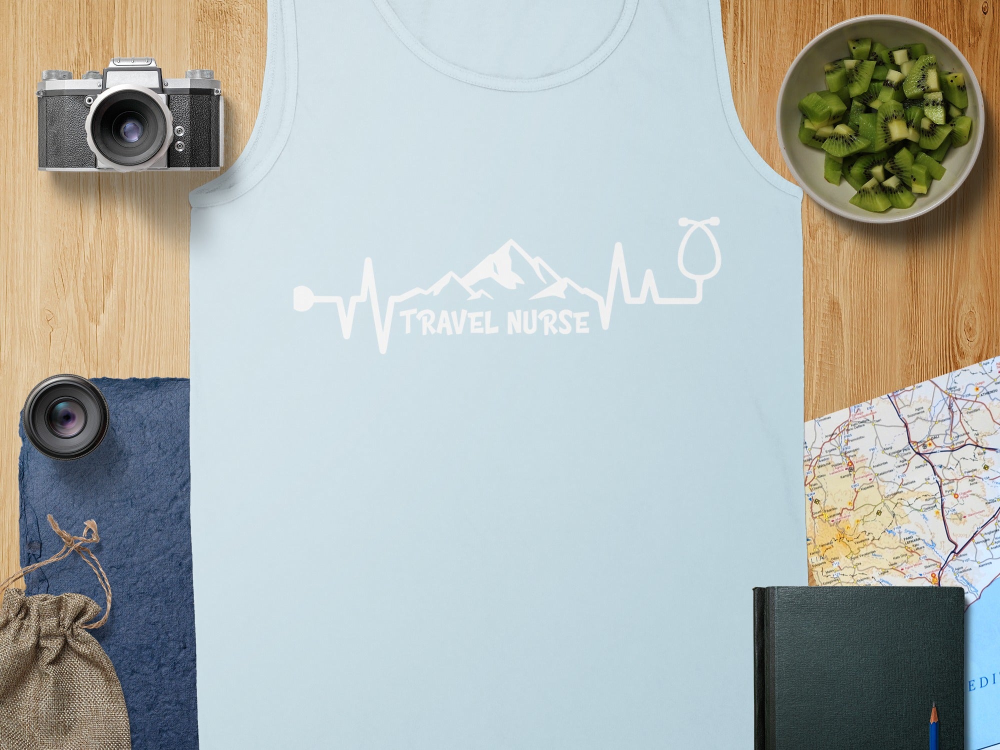 Light blue tank top with "Travel Nurse" electrocardiogram design.