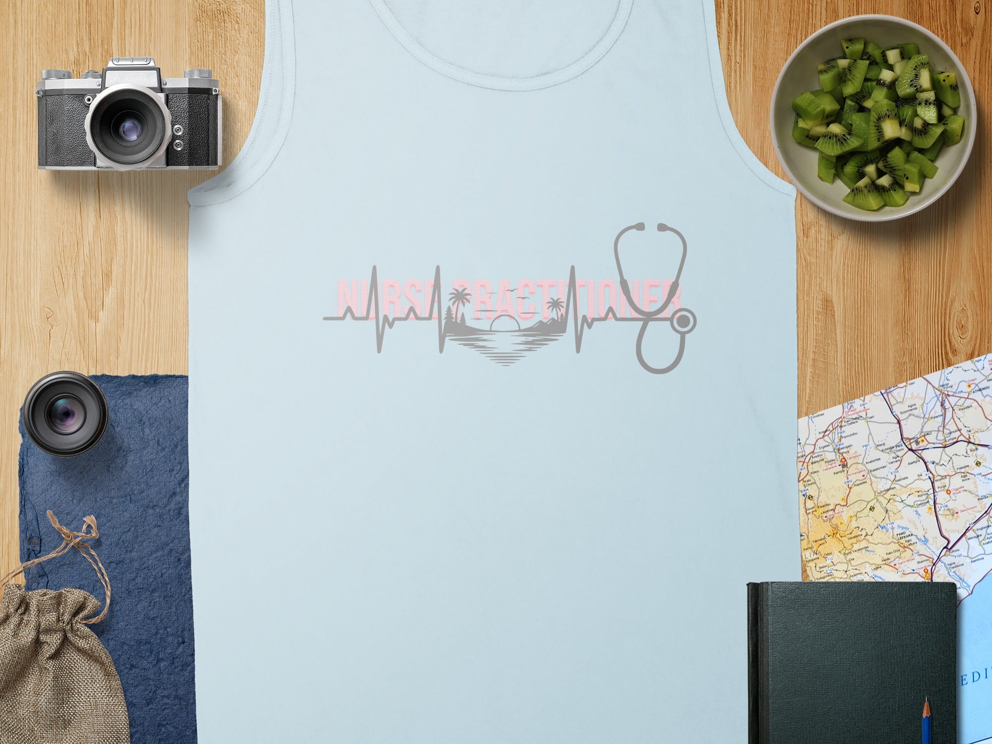 Light blue tank top with "Nurse Life" heartbeat graphic featuring palm trees and a sun.