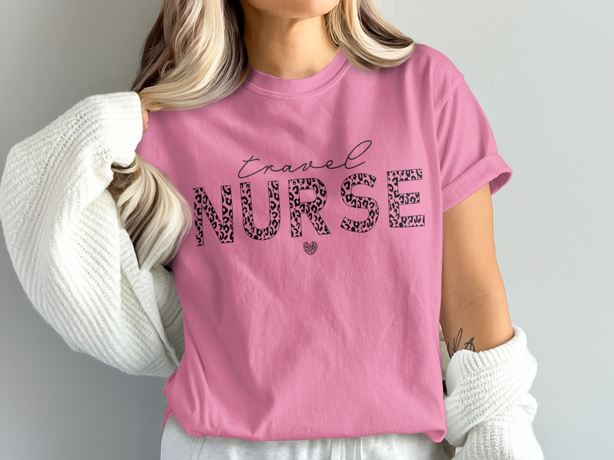 Pink t-shirt with "Travel NURSE" text and leopard print.