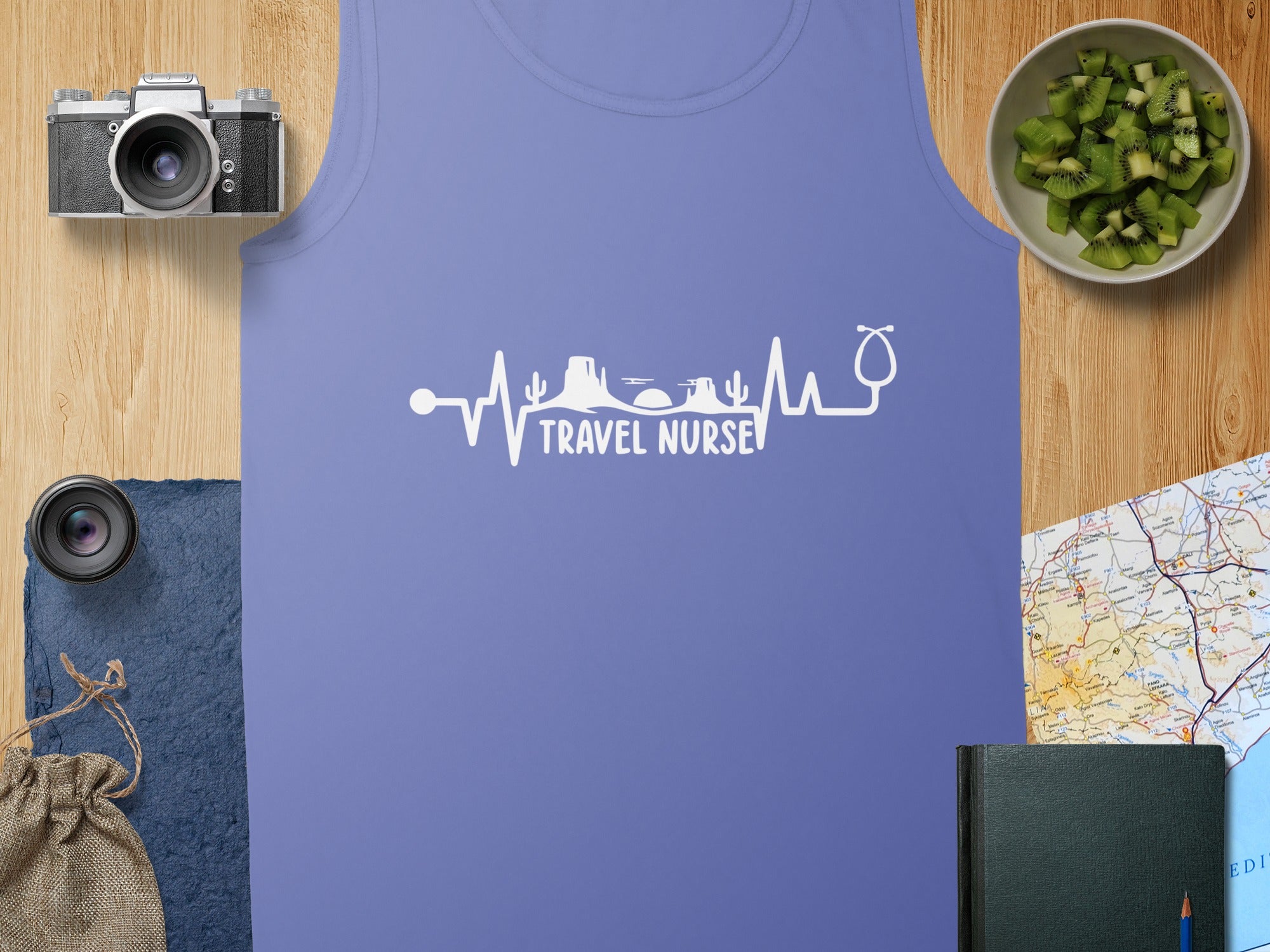 Purple tank top with "TRAVEL NURSE" in a heartbeat design.