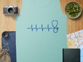 Light blue tank top with a dark blue stethoscope and heartbeat graphic.