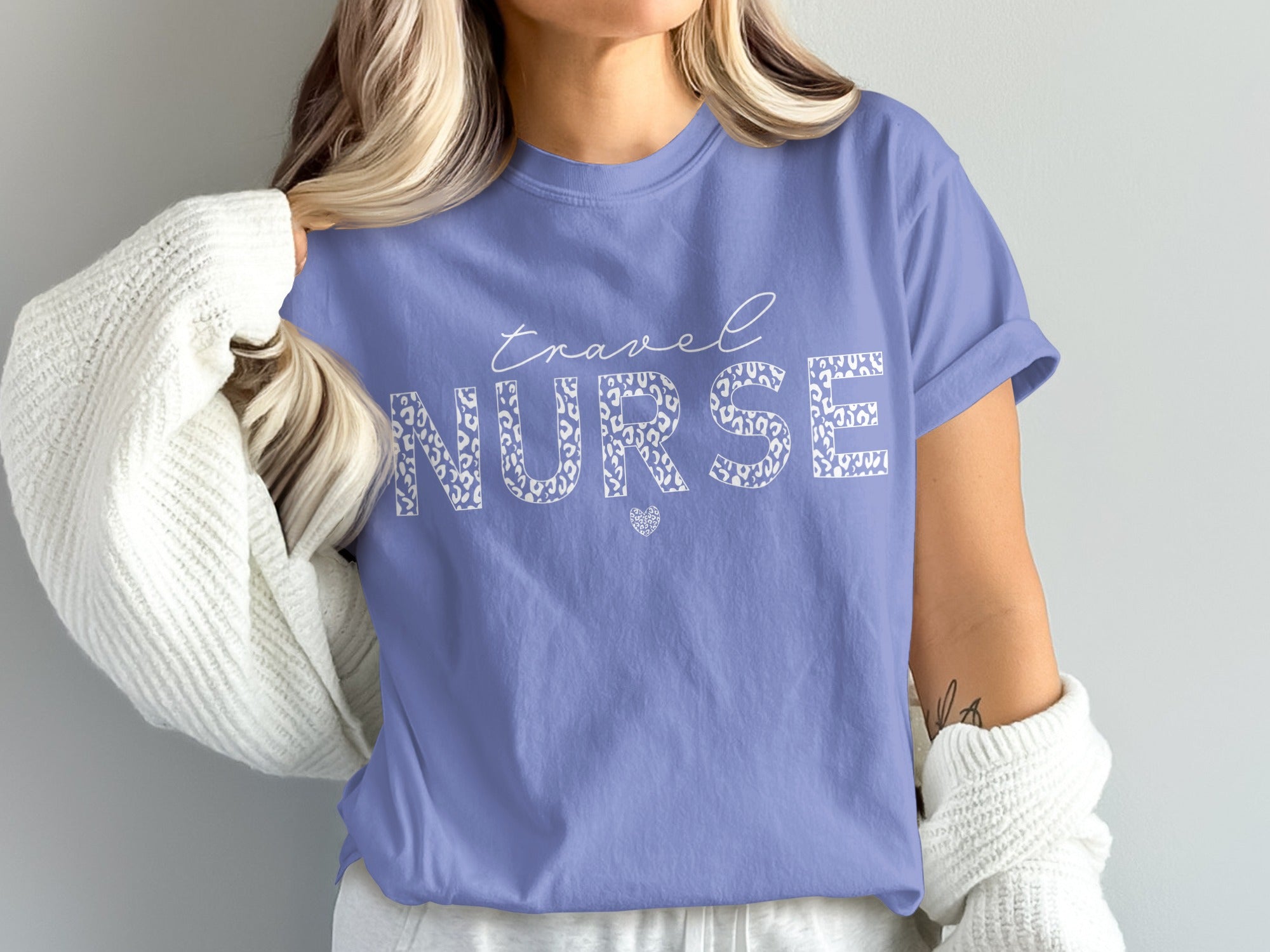 Lavender t-shirt with white leopard print "Travel Nurse" text and heart.