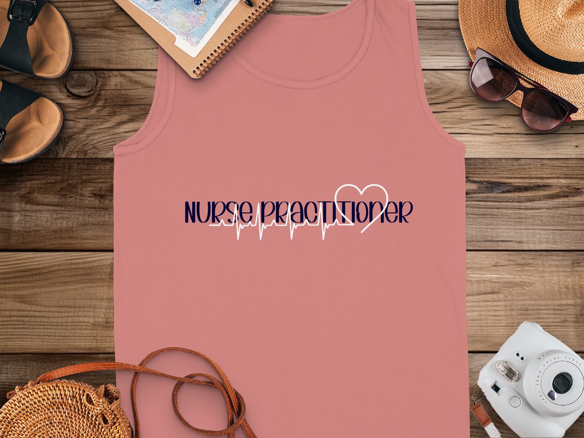Pink tank top with "Nurse Practitioner" and heartbeat graphic.