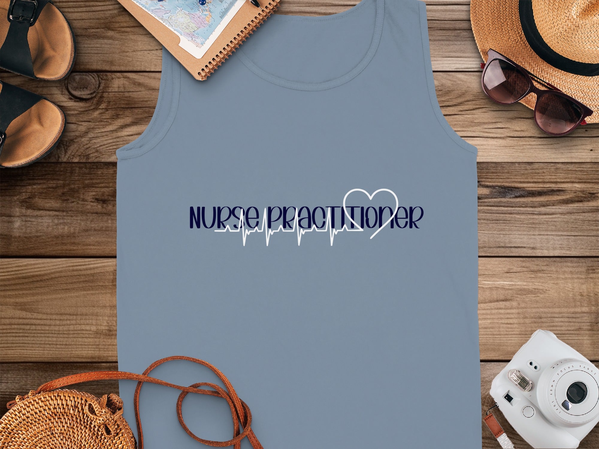 Blue tank top with "Nurse Practitioner" and a heartbeat graphic.