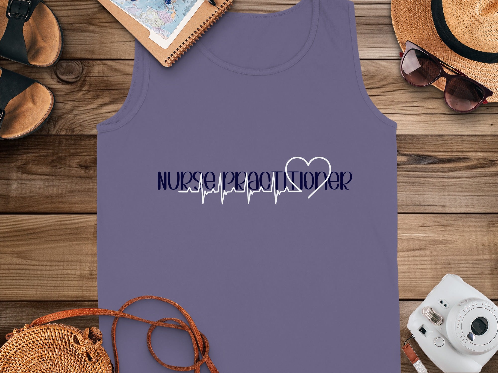 Purple tank top with "Nurse Practitioner" and heart monitor graphic.