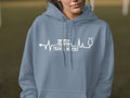 Gray hoodie with white stethoscope and RV graphic, "TRAVEL NURSE" text.