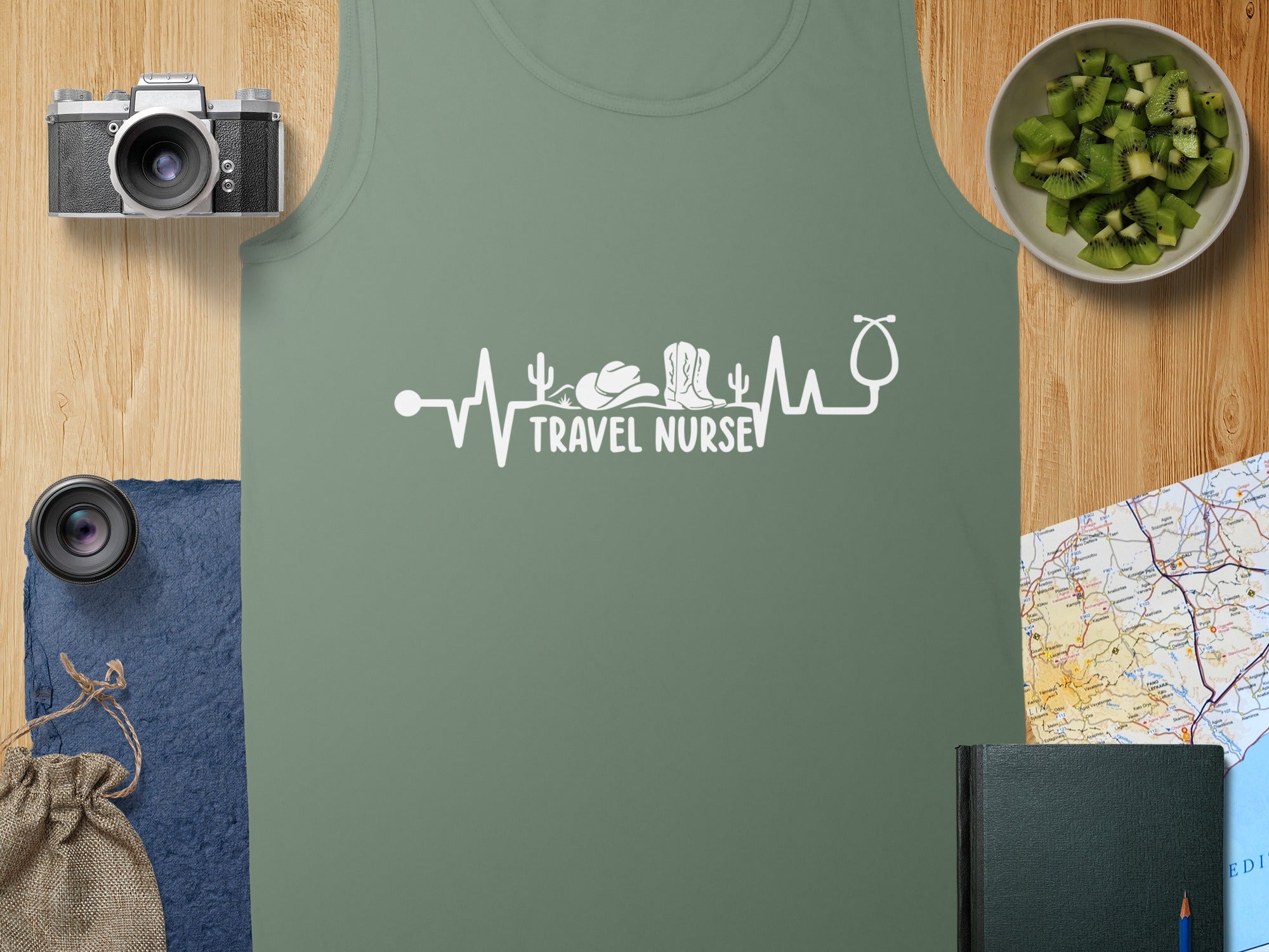 Olive green tank top with "Travel Nurse" stethoscope and cowboy boot design.