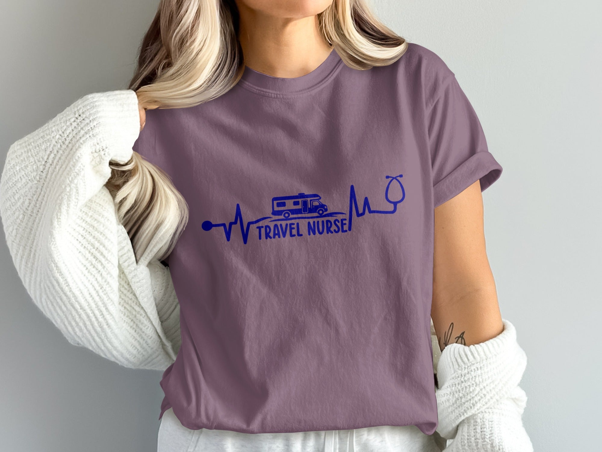 T-shirt with travel nurse heartbeat design featuring RV and stethoscope.