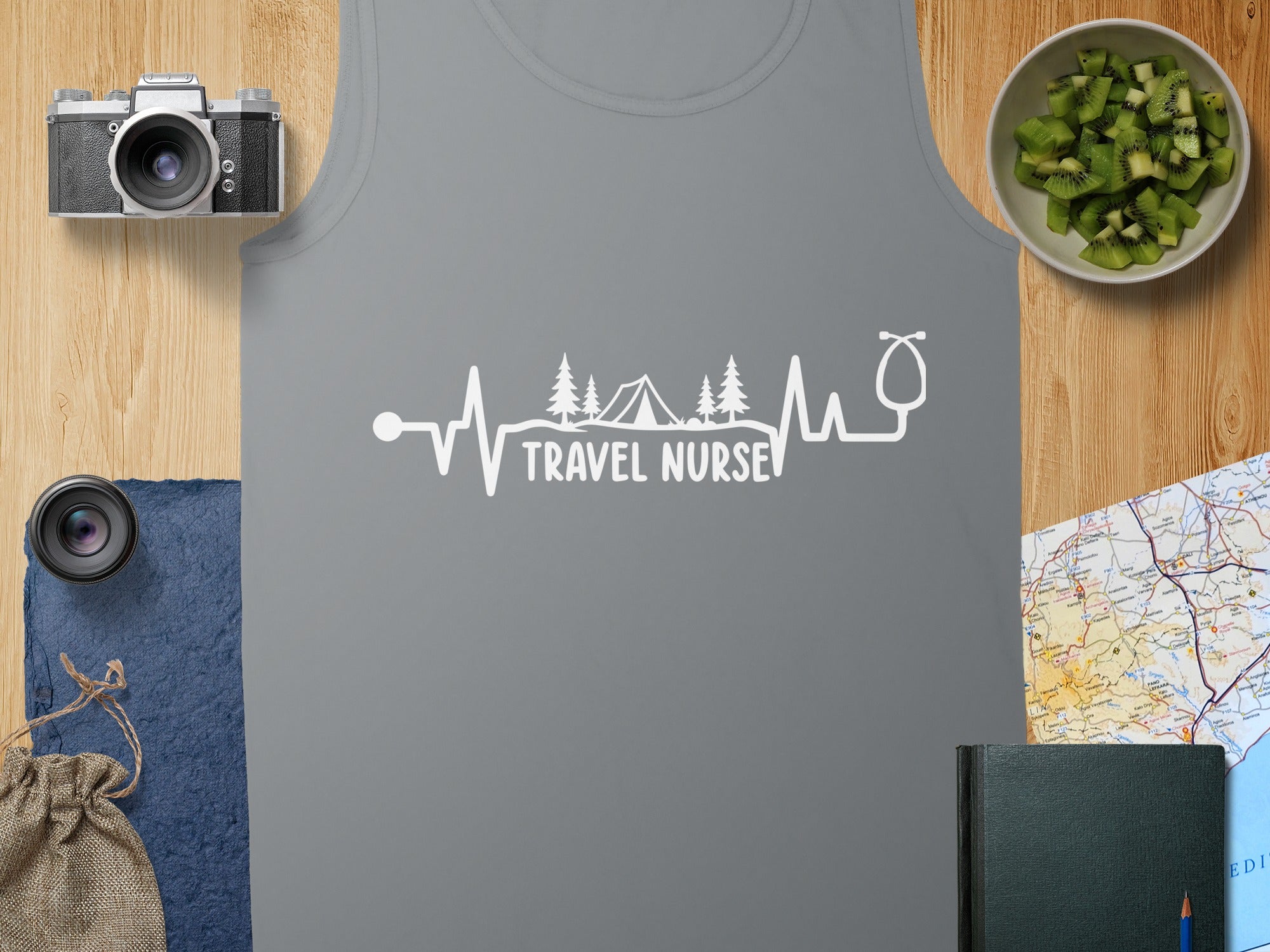 Gray tank top with "TRAVEL NURSE" stethoscope graphic and camping scene.