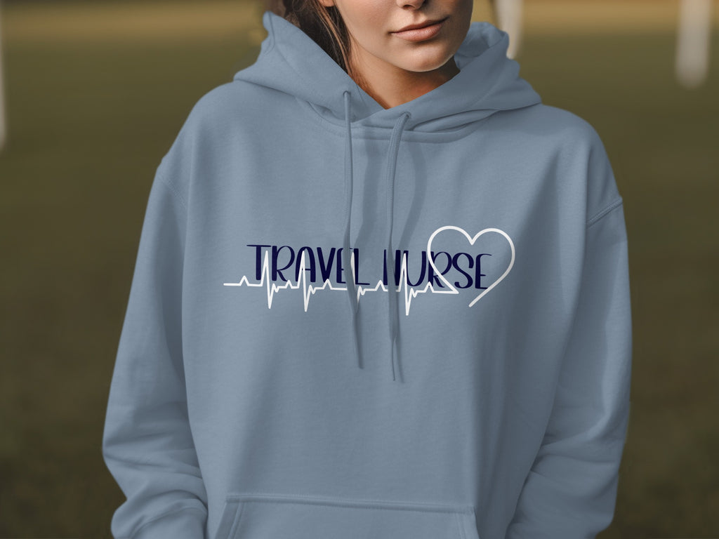 Blue hoodie with "TRAVEL NURSE" text and heart heartbeat graphic.