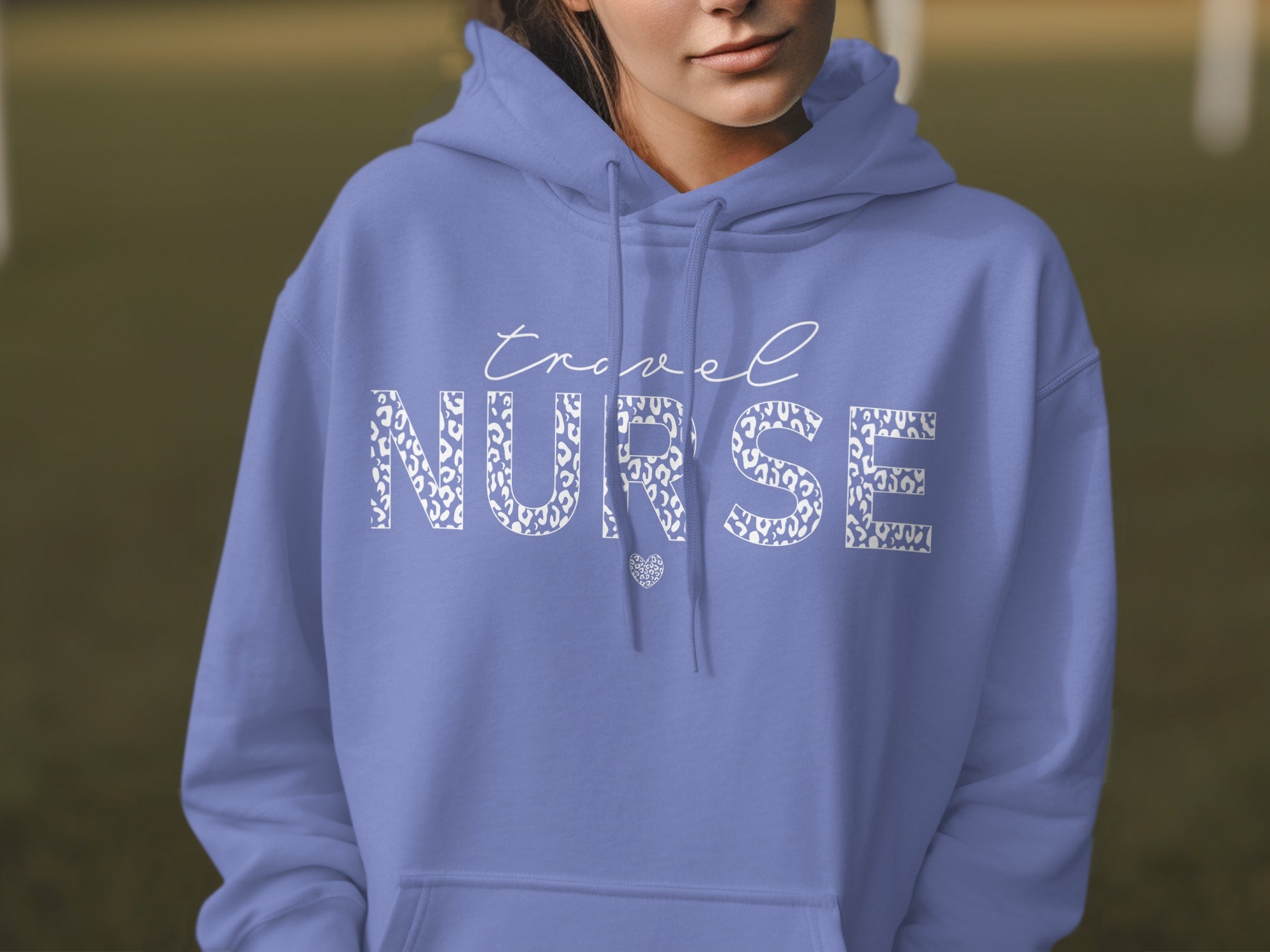 Blue hoodie with "Travel Nurse" text in leopard print.
