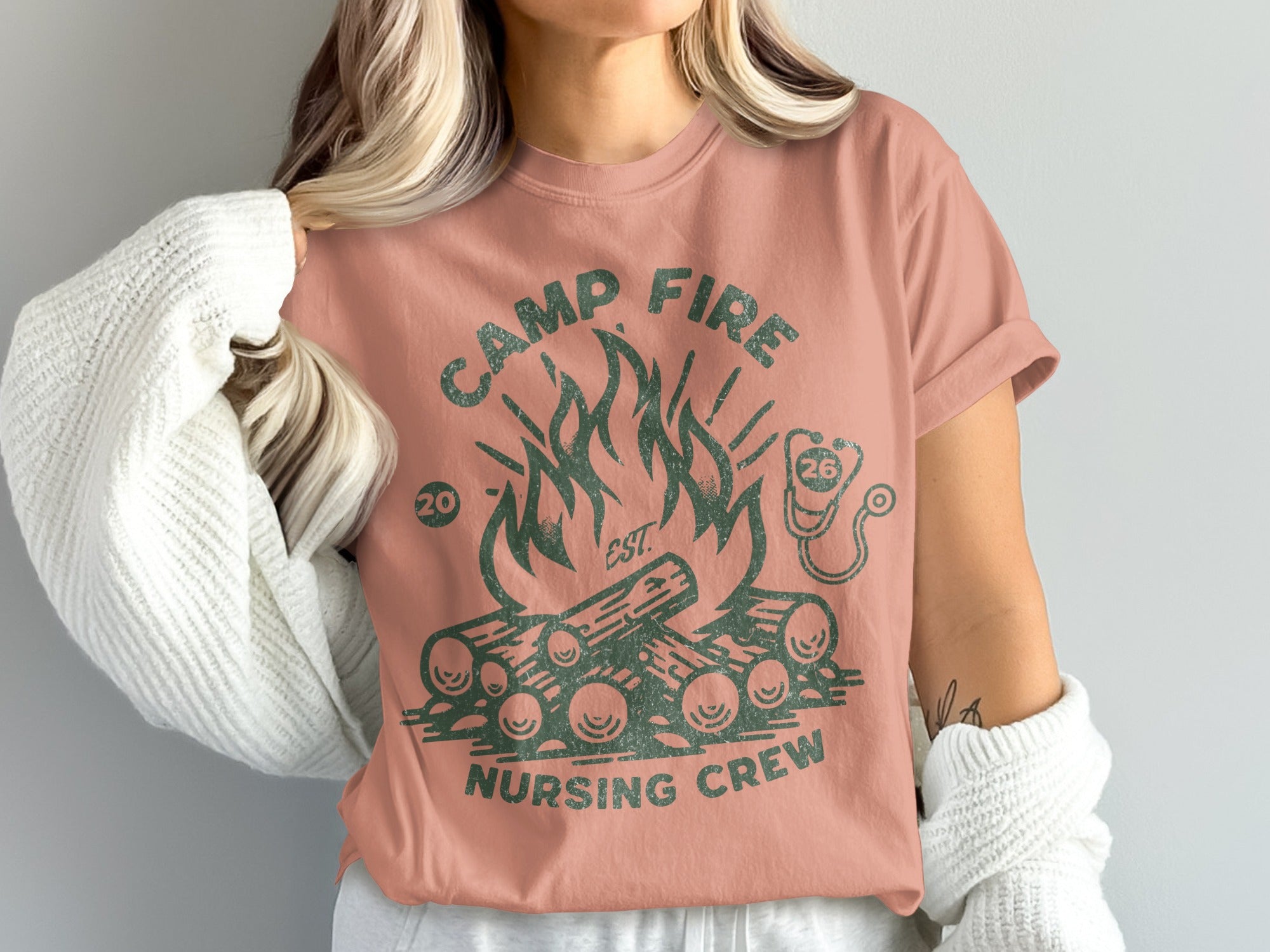 Camp Fire Nursing Crew graphic tee with campfire and stethoscope design.