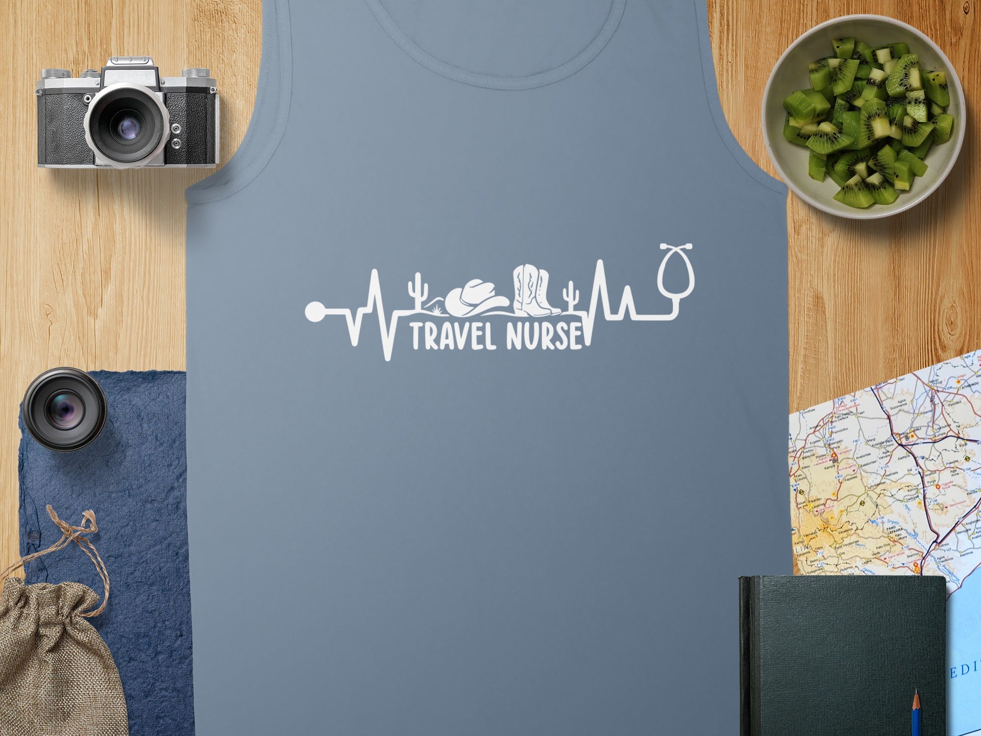 Tank top with "TRAVEL NURSE" and heartbeat graphic, featuring cowboy boots and stethoscope.