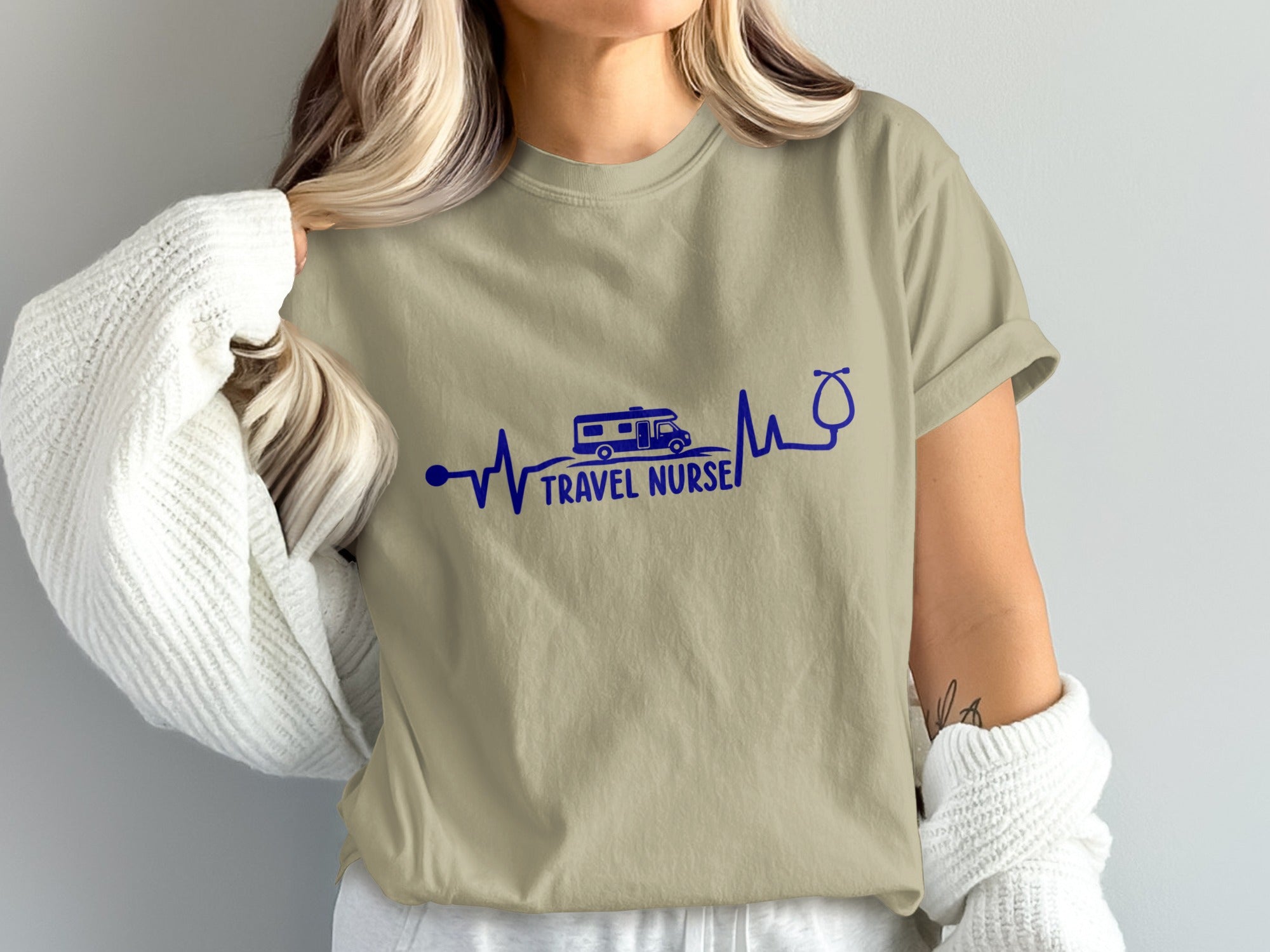 Tan t-shirt with blue stethoscope, RV, and heartbeat graphic.