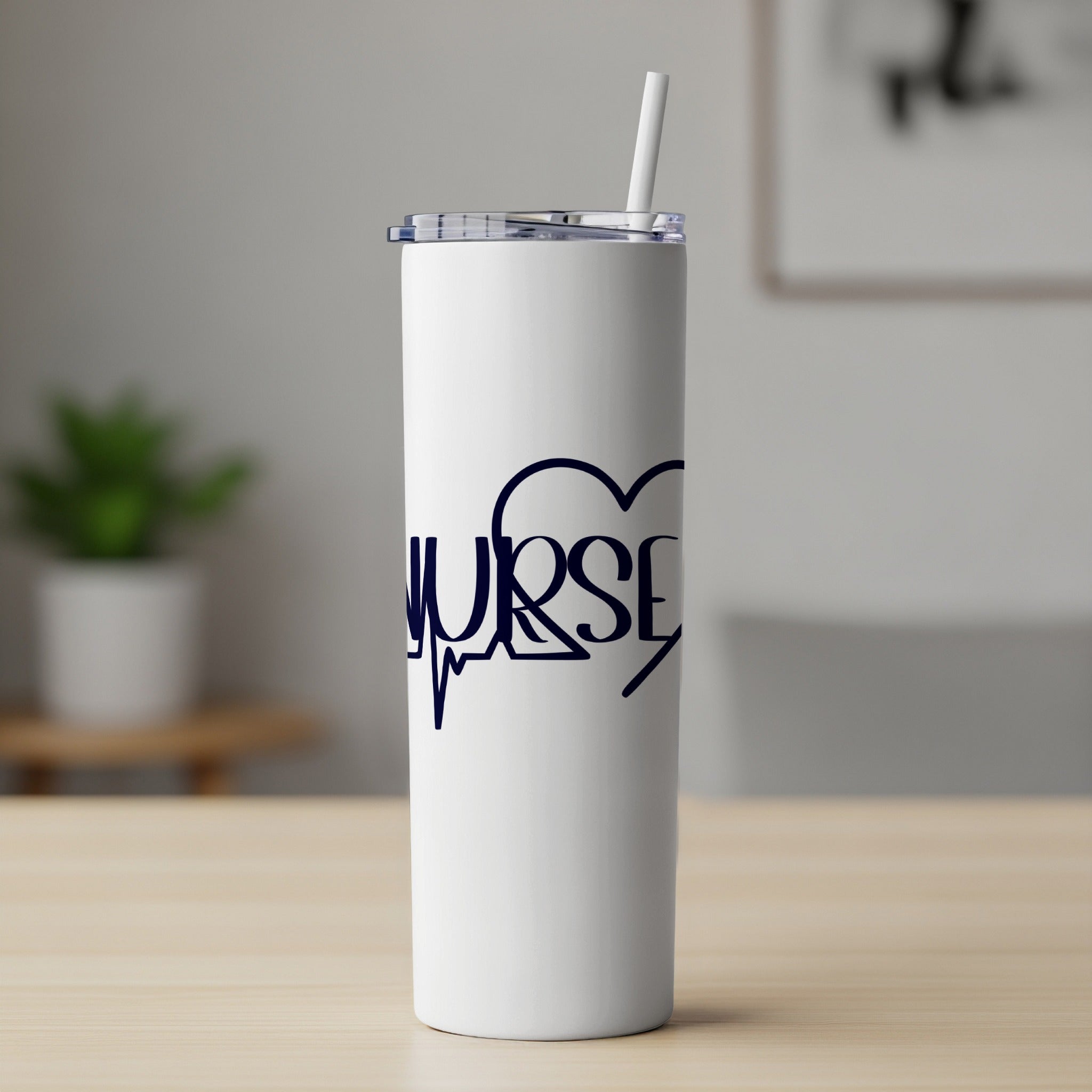 White tumbler with "NURSE" in a heart outline and a straw.